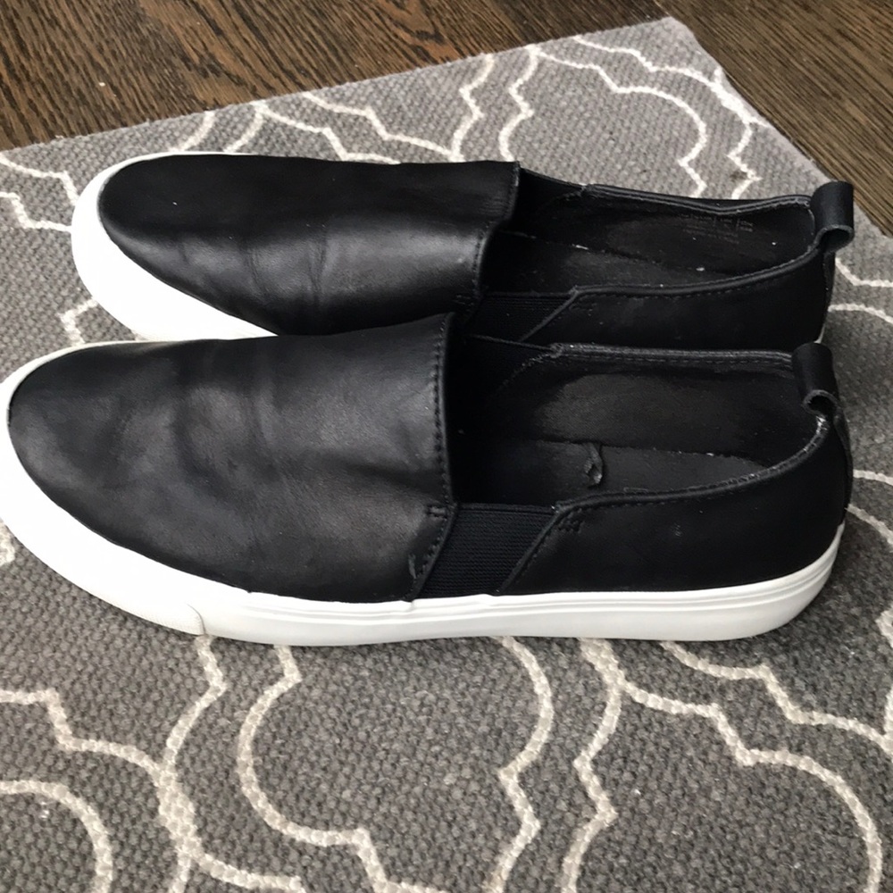 Black and white slip on sneakers